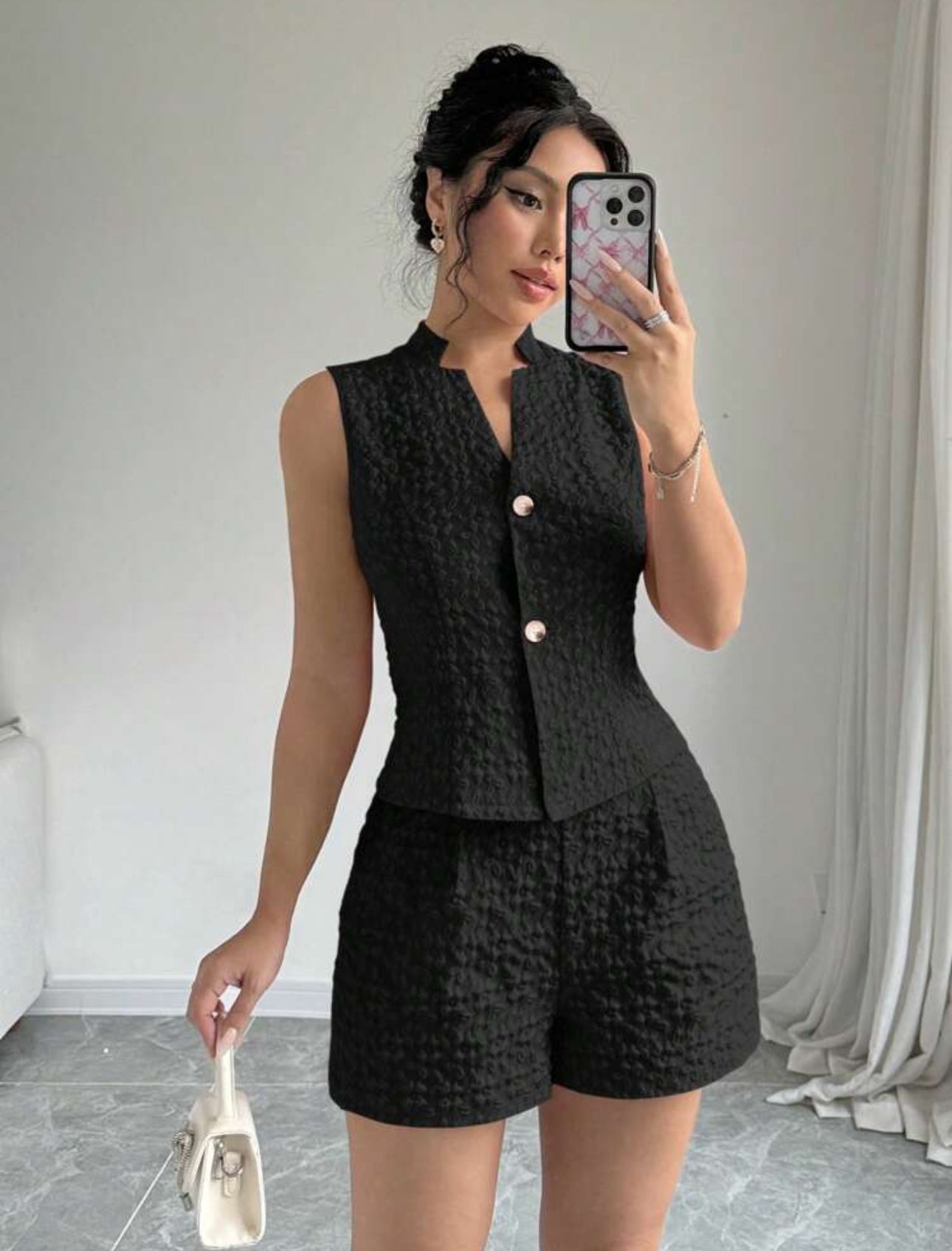 Conjunto de top sin mangas con botones delanteros y shorts
