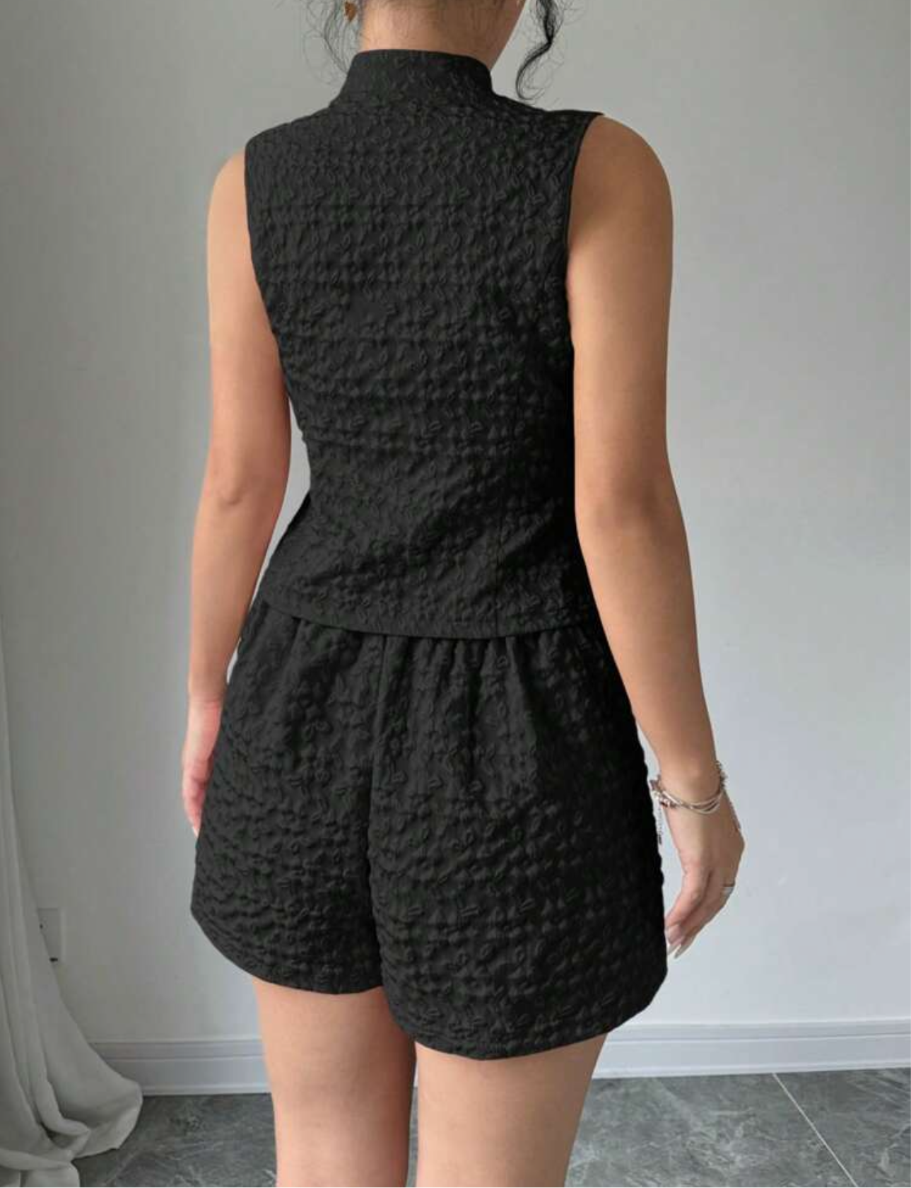 Conjunto de top sin mangas con botones delanteros y shorts