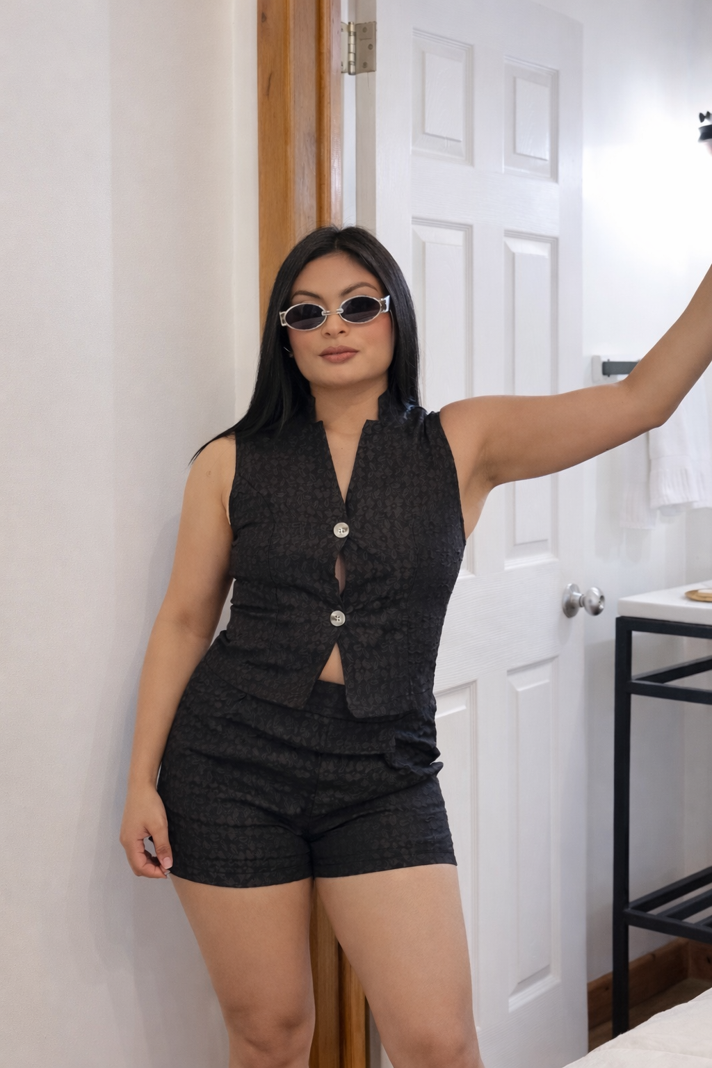 Conjunto de top sin mangas con botones delanteros y shorts